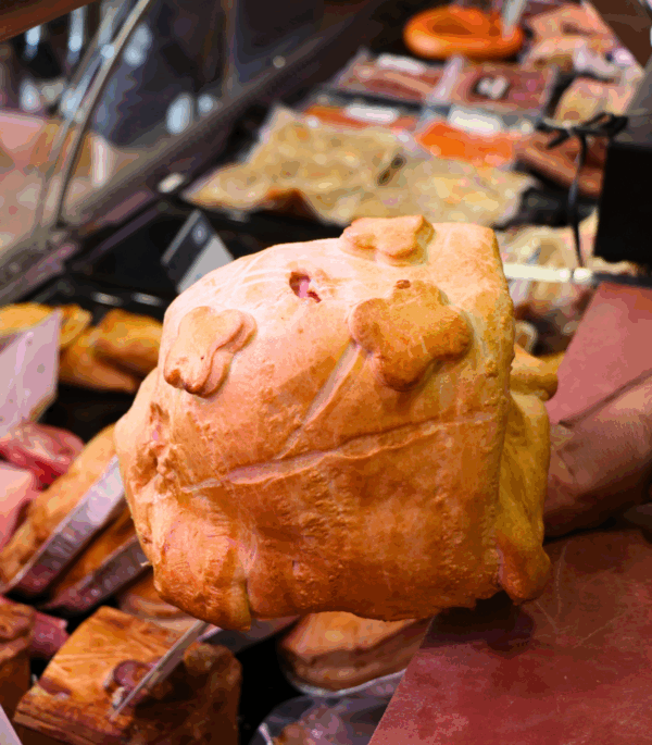 jambon en croûte entier porté à la main