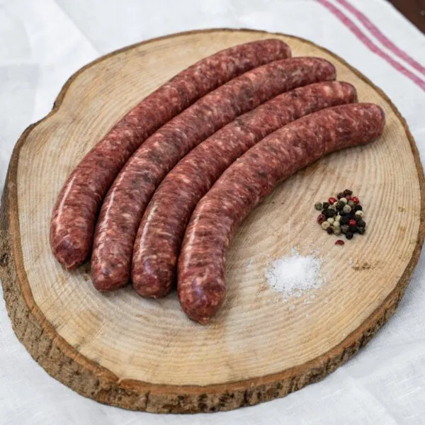 chipolatas de sanglier sur rondin de bois