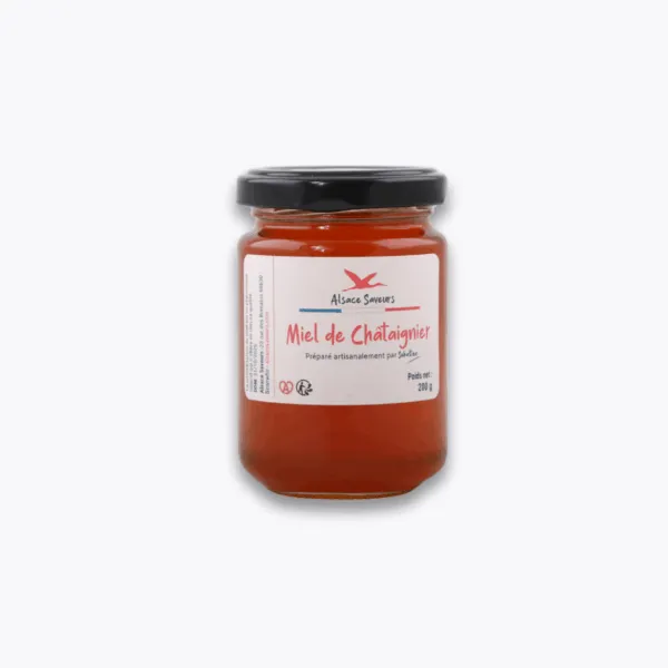 pot de miel de châtaignier sur fond gris