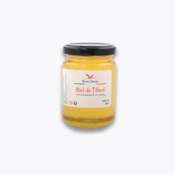 pot de miel de tilleul sur fond gris