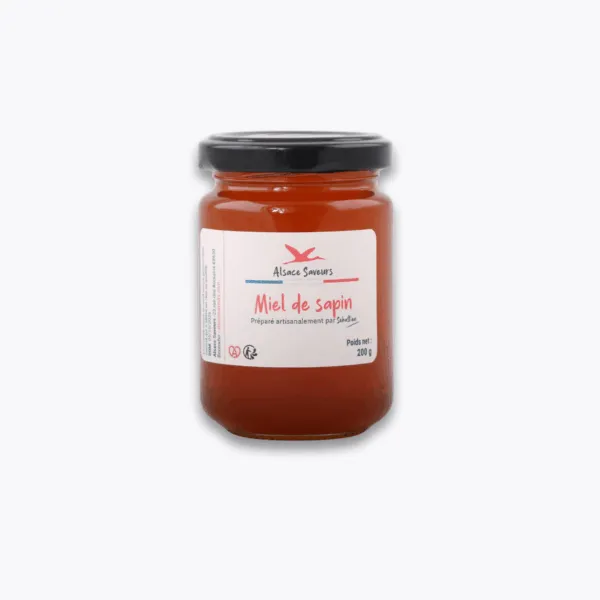 pot de miel de sapin sur fond gris